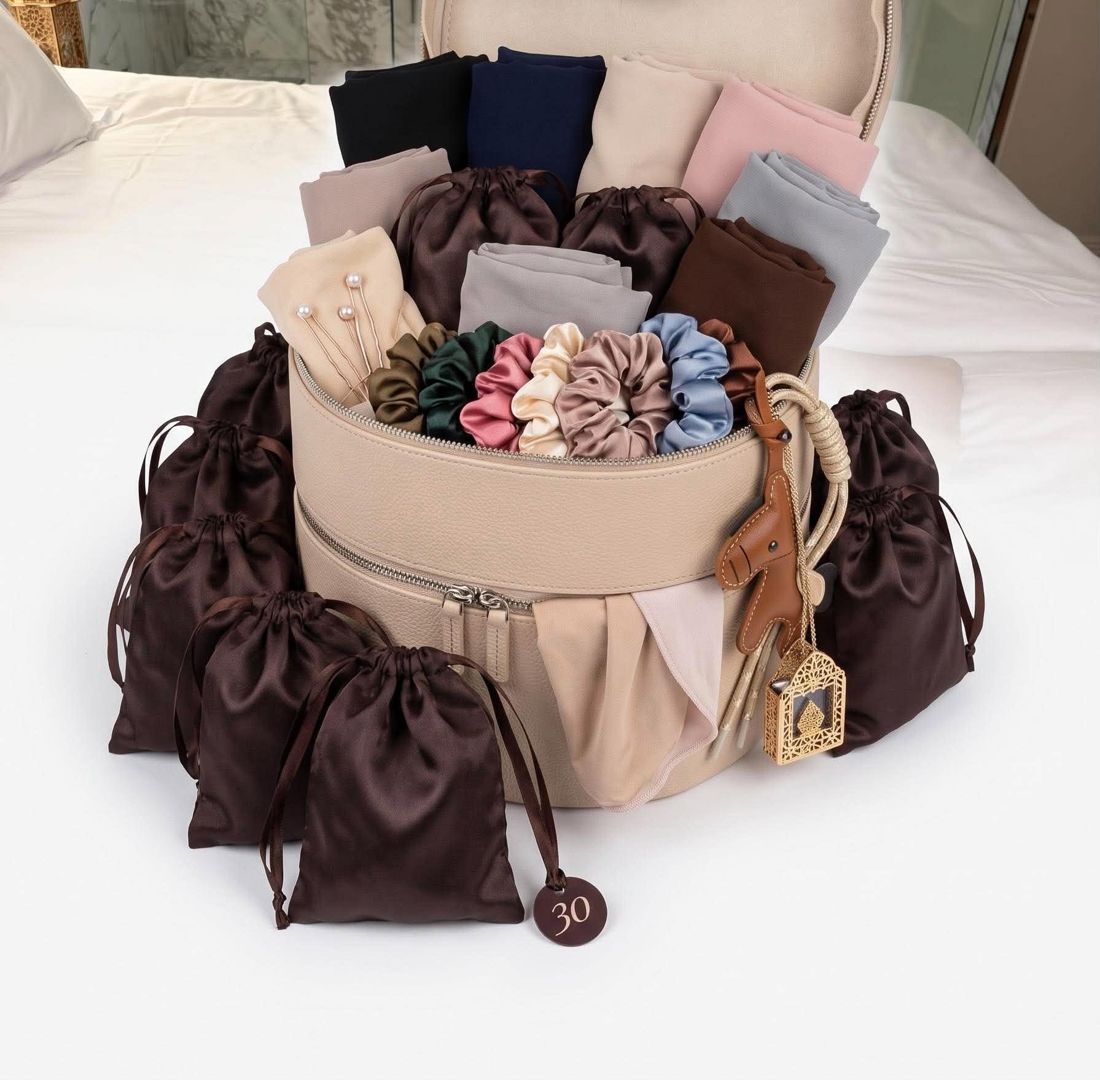 Hijab Edition: vanity case with folded chiffon hijabs, silk scrunchies, pearl pins and satin pouches